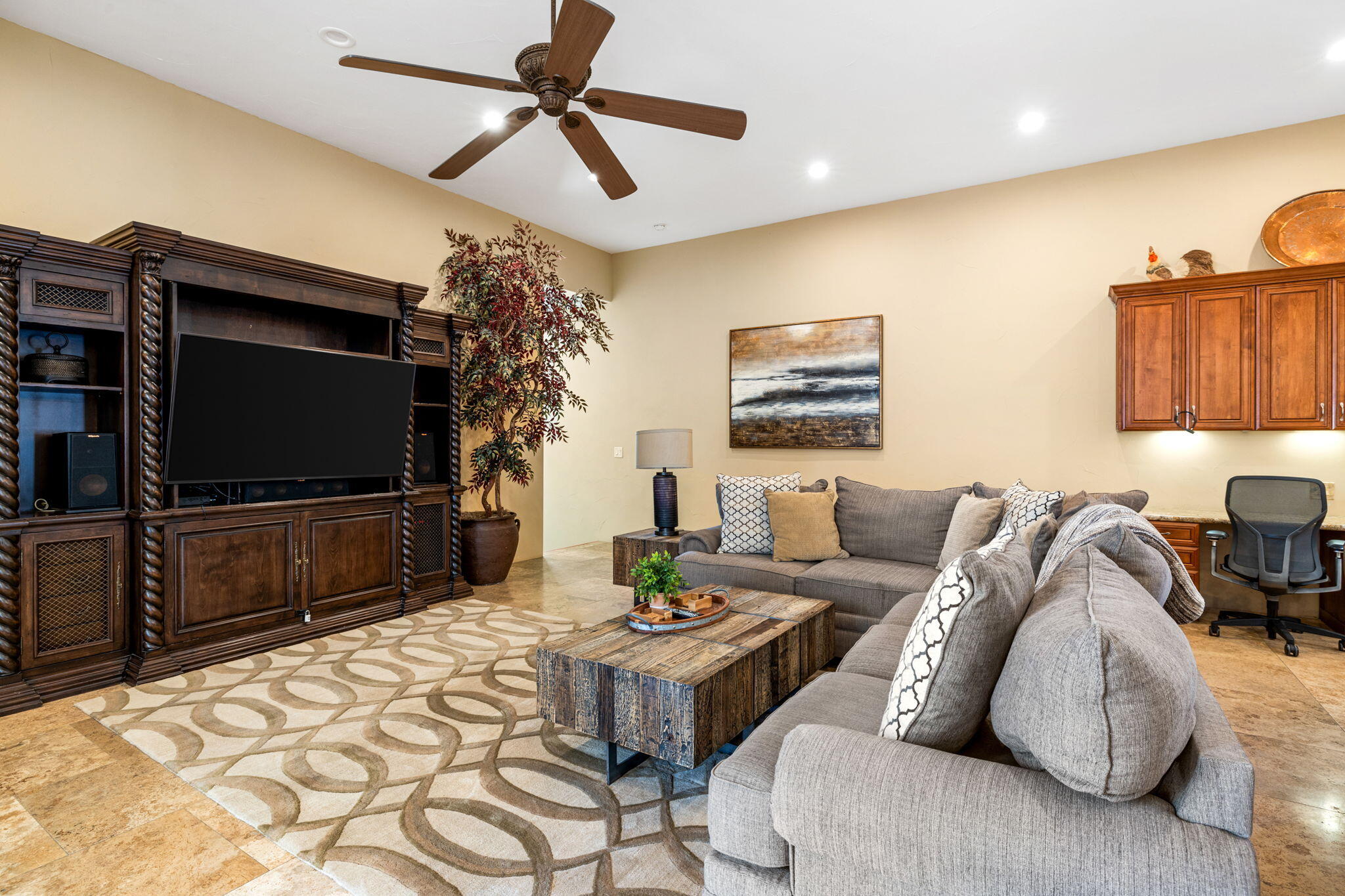 72033 Clancy Lane Rancho Mirage, CA 92270 - Photo 39 of 83 a living room with furniture and a flat screen tv