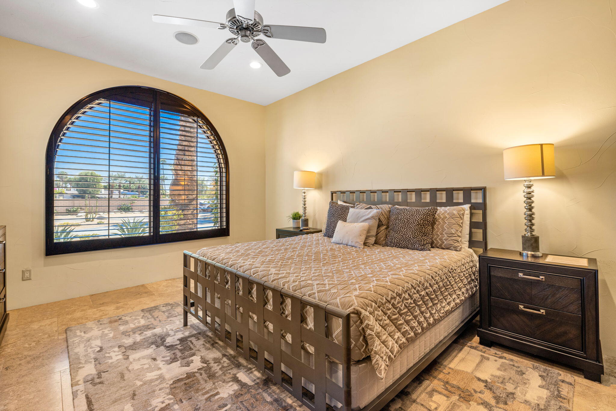 72033 Clancy Lane Rancho Mirage, CA 92270 - Photo 51 of 83 a bedroom with a bed and a night stand