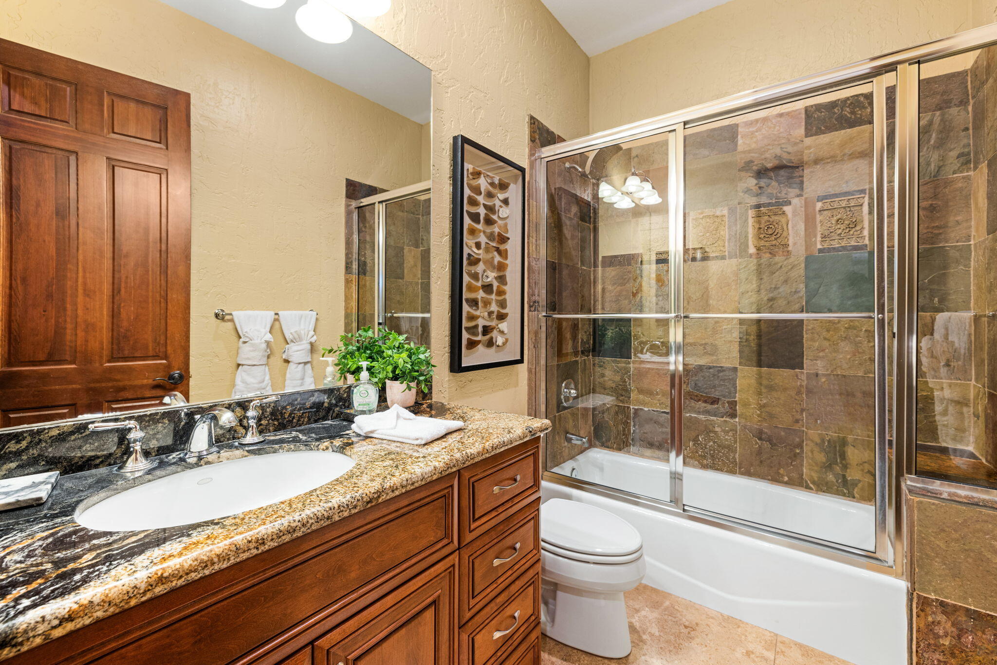 72033 Clancy Lane Rancho Mirage, CA 92270 - Photo 52 of 83 a bathroom with a granite countertop sink toilet and shower
