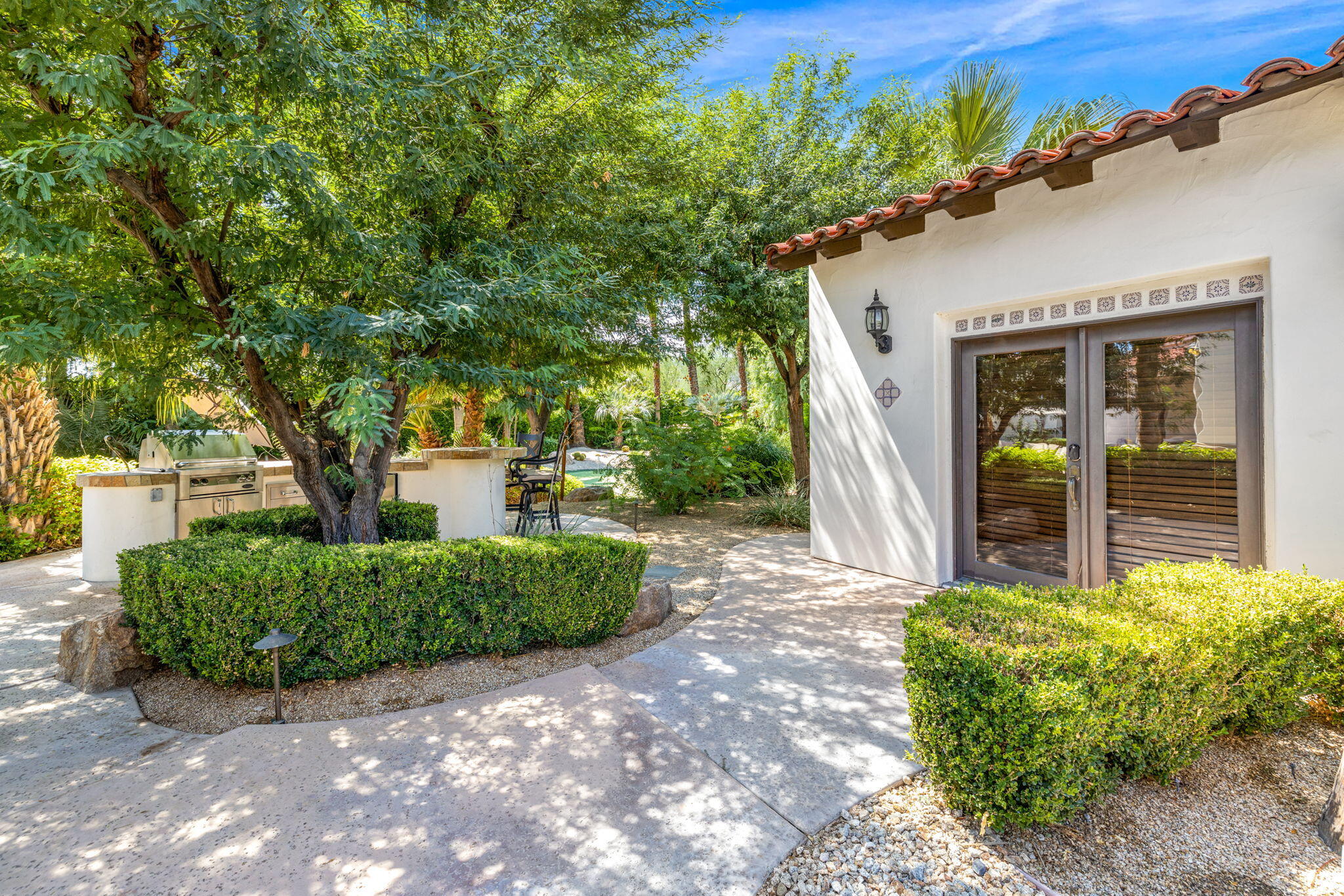 72033 Clancy Lane Rancho Mirage, CA 92270 - Photo 63 of 83 front view of a house with a yard