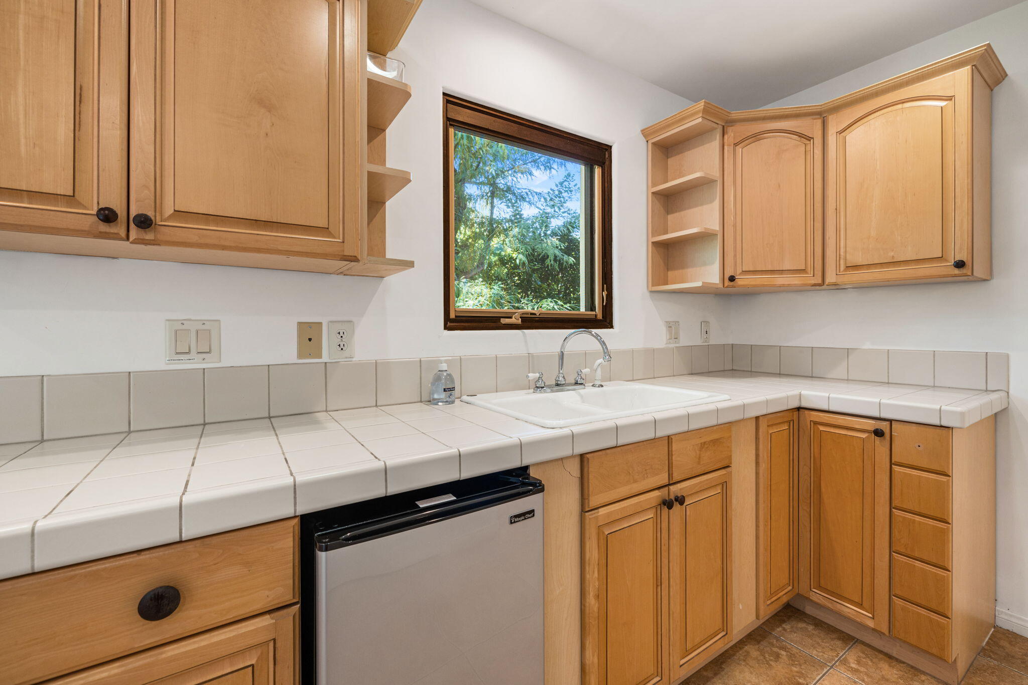 72033 Clancy Lane Rancho Mirage, CA 92270 - Photo 66 of 83 a kitchen with a sink cabinets and window