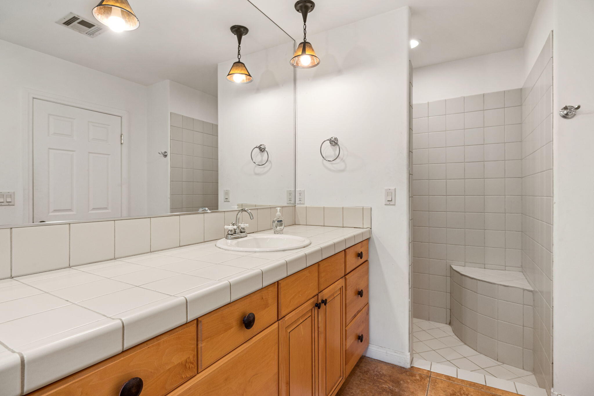 72033 Clancy Lane Rancho Mirage, CA 92270 - Photo 67 of 83 a bathroom with a sink a toilet and shower