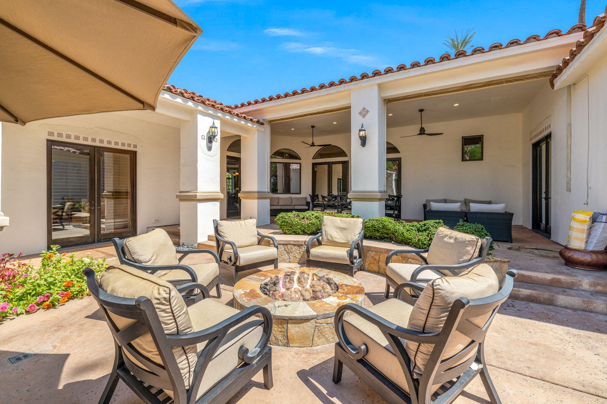 72033 Clancy Lane Rancho Mirage, CA 92270 - Photo 79 of 83 a view of a patio with couches table and chairs