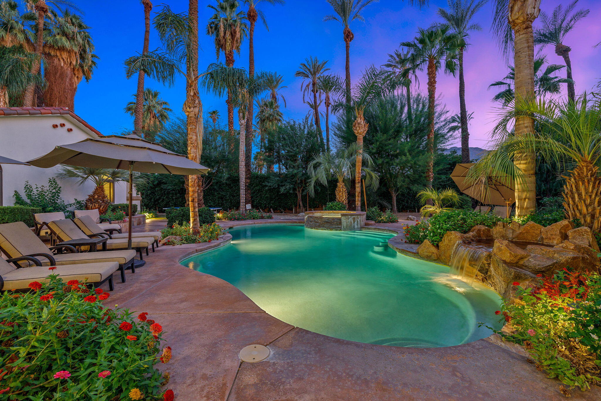 72033 Clancy Lane Rancho Mirage, CA 92270 - Photo 9 of 83 a view of a swimming pool with sitting area