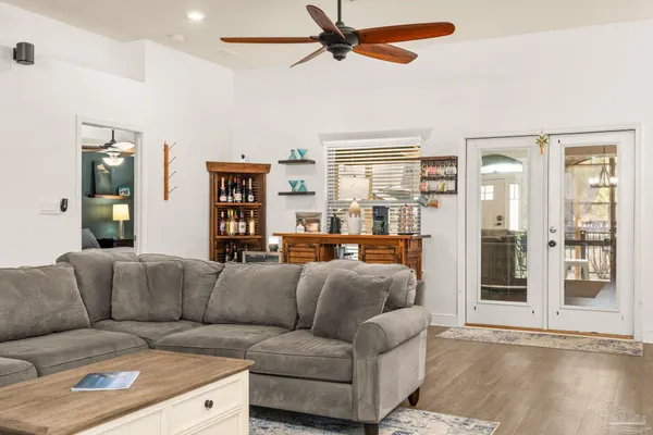 a living room with furniture and a window