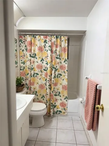 a living room with a piano and a flat screen tv