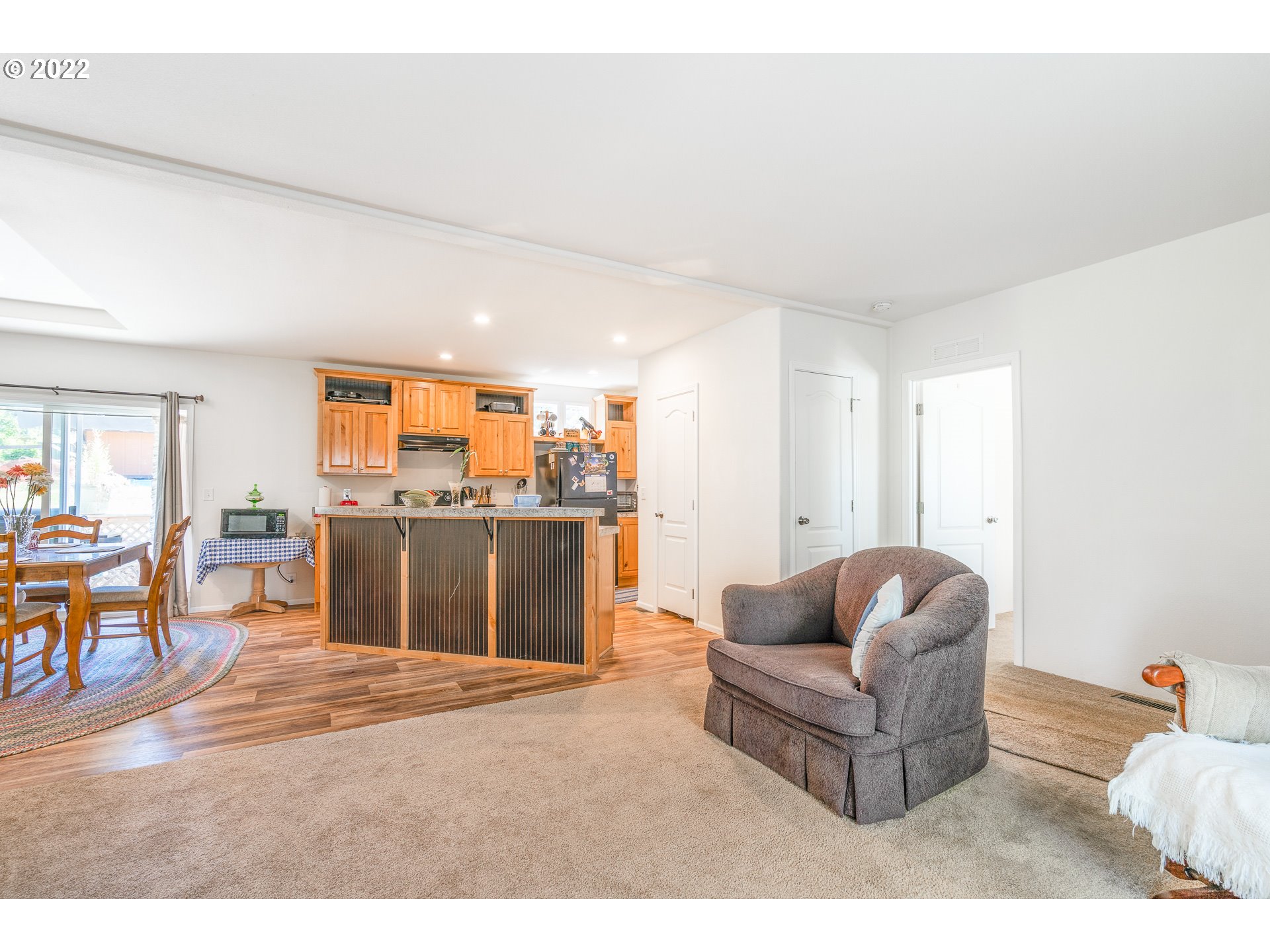37220 Tree Farm Road Springfield, OR 97478 - Photo 5 of 32 a living room with furniture and a flat screen tv