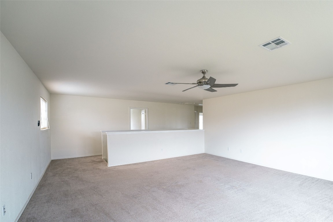 612 Dark Tree Lane Round Rock, TX 78664 - Photo 21 of 40 a view of a big room with carpet