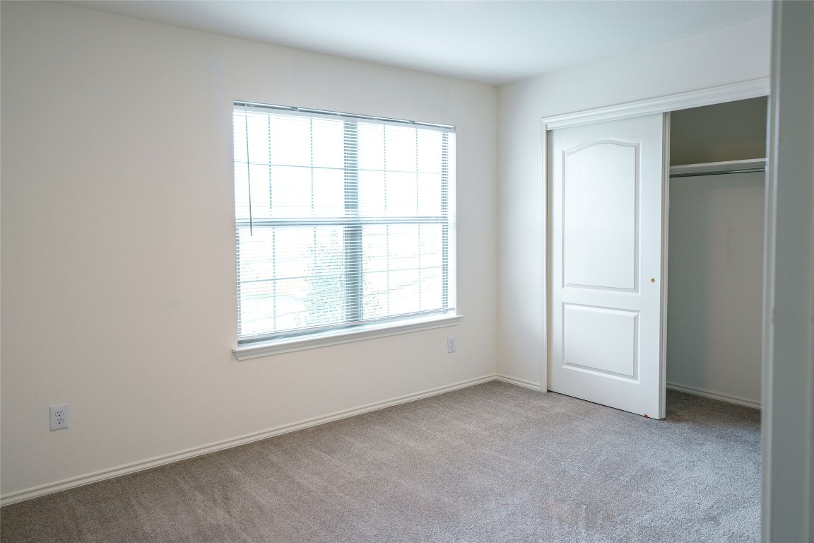 612 Dark Tree Lane Round Rock, TX 78664 - Photo 25 of 40 an empty room with windows