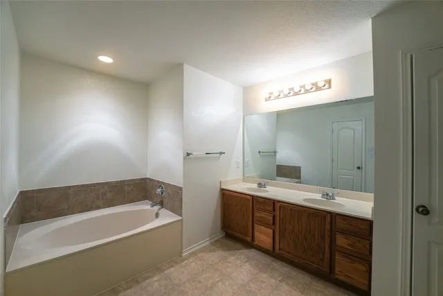 a bathroom with a toilet and a sink