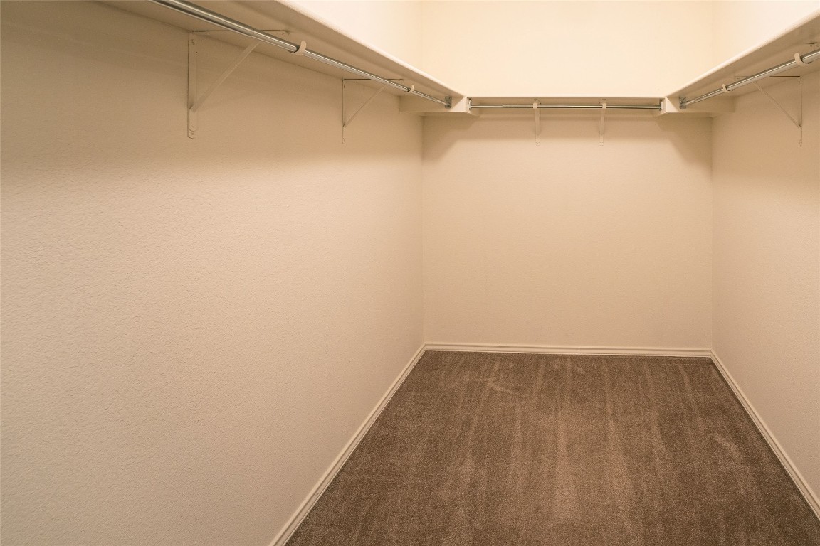 612 Dark Tree Lane Round Rock, TX 78664 - Photo 36 of 40 a view of small space with racks on the wall