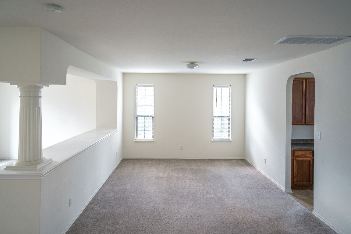 612 Dark Tree Lane Round Rock, TX 78664 - Photo 37 of 40 a view of an empty room with a window