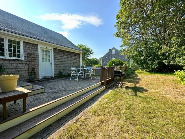 a view of swimming pool with chairs