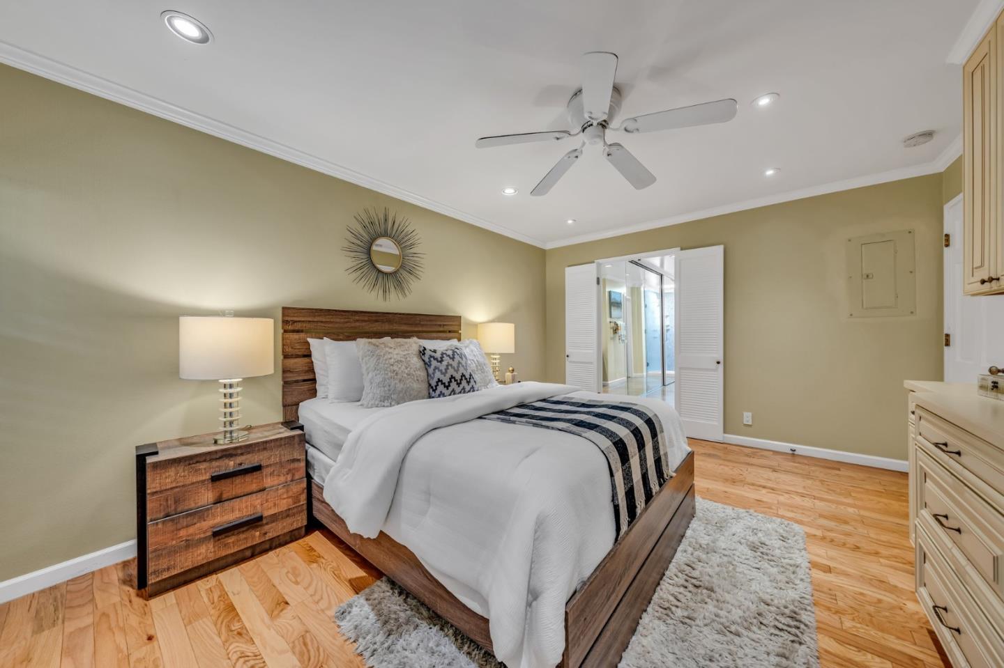 8 Los Altos Square Los Altos, CA 94022 - Photo 22 of 53 a bedroom with a bed and cabinet