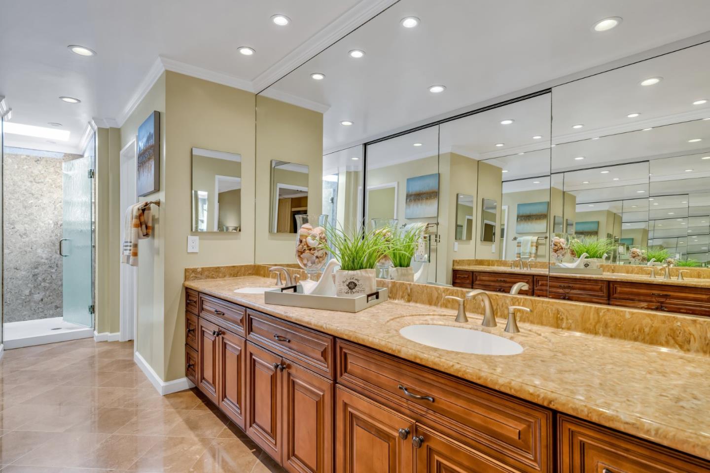 8 Los Altos Square Los Altos, CA 94022 - Photo 23 of 53 a bathroom with a granite countertop sink and a large mirror