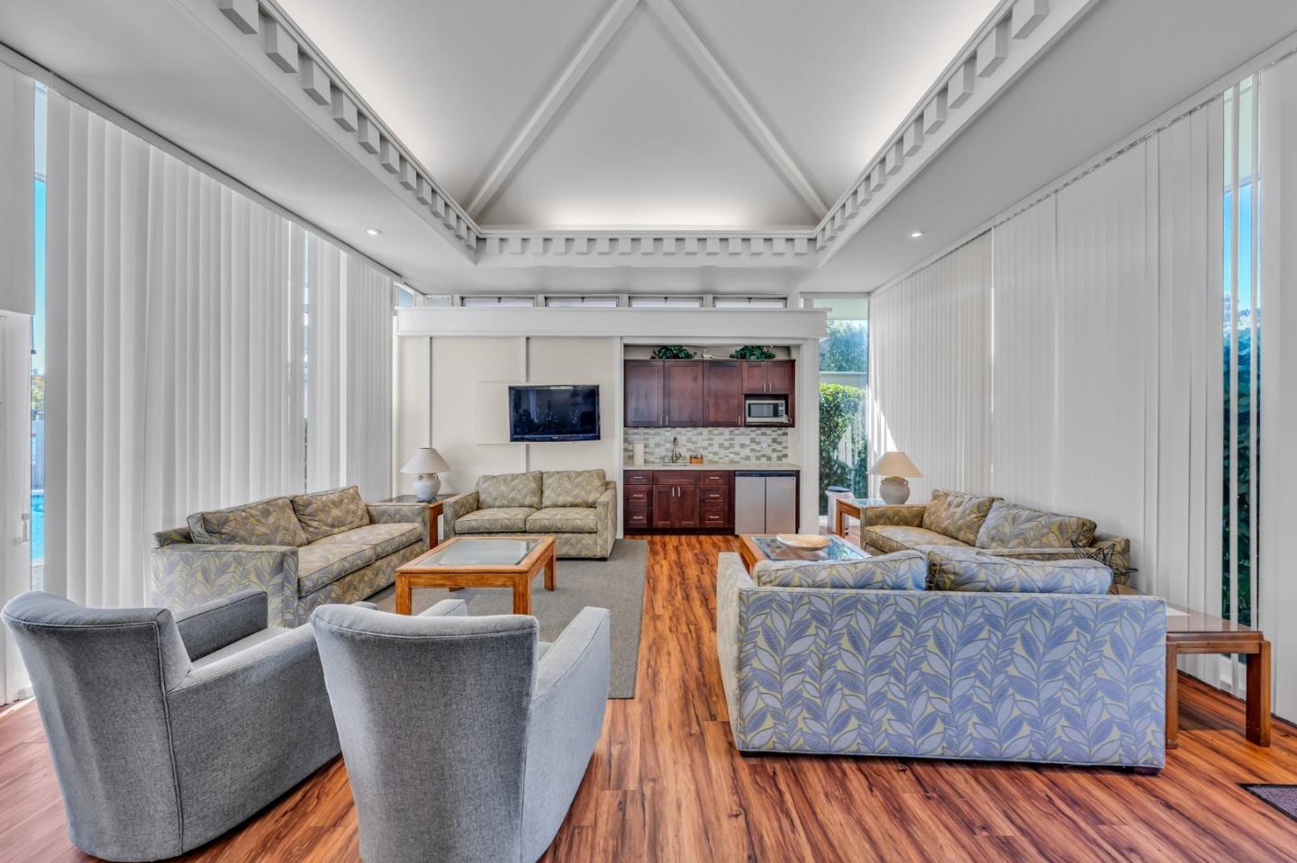 8 Los Altos Square Los Altos, CA 94022 - Photo 40 of 53 a living room with furniture and a flat screen tv