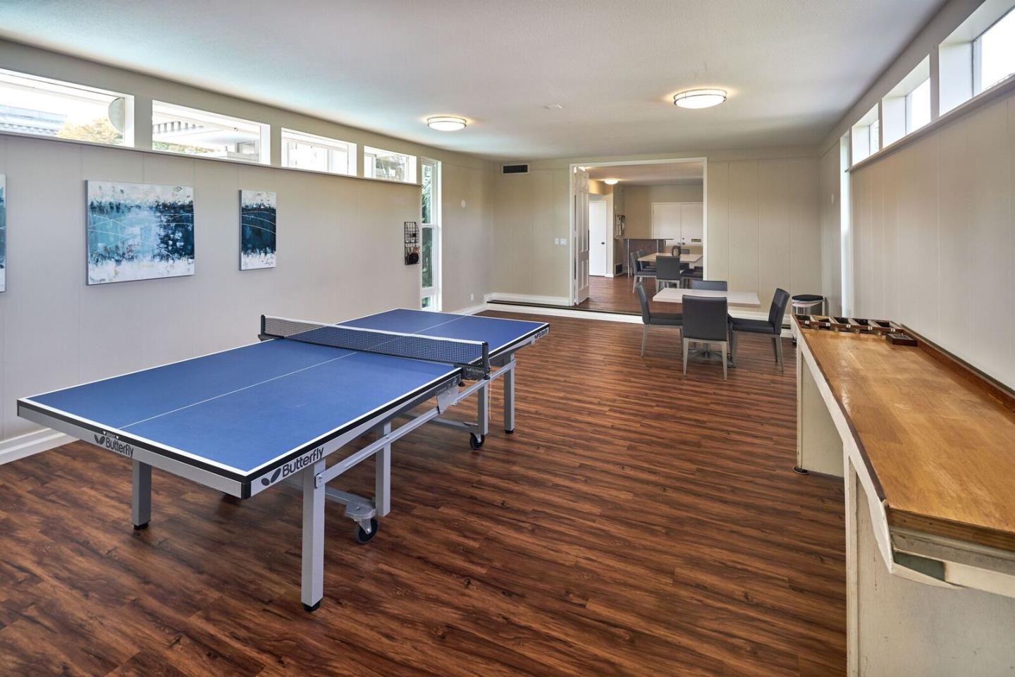 8 Los Altos Square Los Altos, CA 94022 - Photo 42 of 53 a room with wooden floor pool table and windows