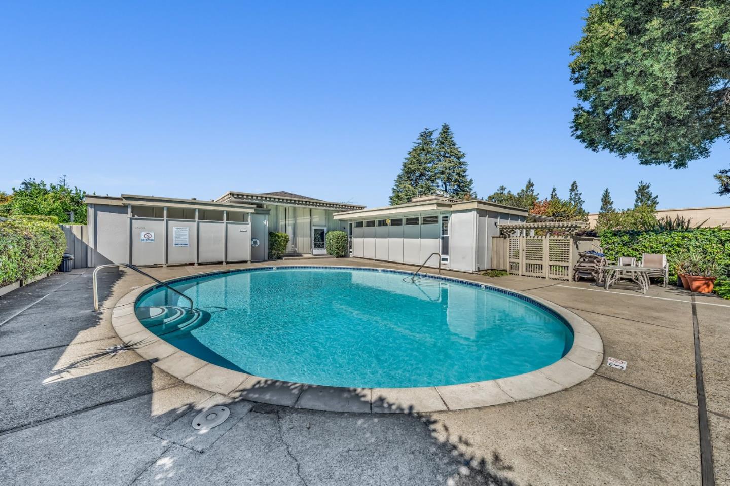 8 Los Altos Square Los Altos, CA 94022 - Photo 46 of 53 a view of a swimming pool with a patio