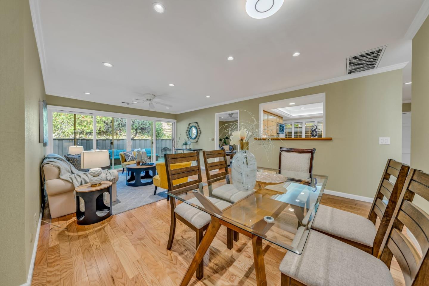 8 Los Altos Square Los Altos, CA 94022 - Photo 9 of 53 a living room with furniture and a floor to ceiling window