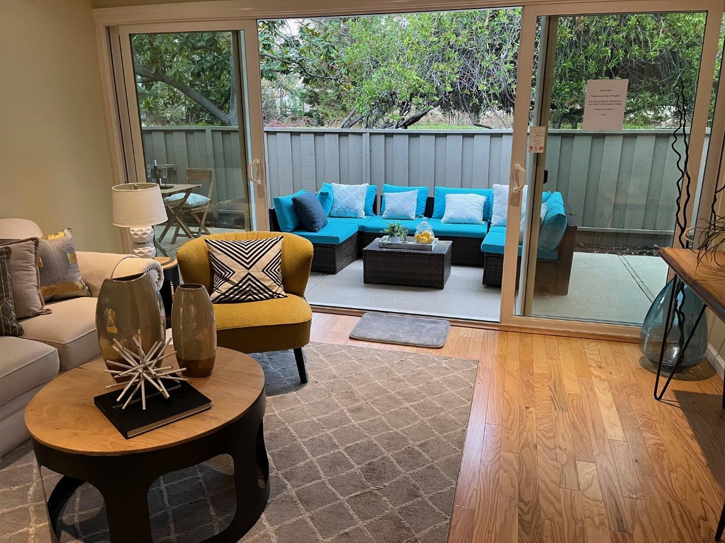 8 Los Altos Square Los Altos, CA 94022 - Photo 10 of 53 a living room with furniture and a wooden floor