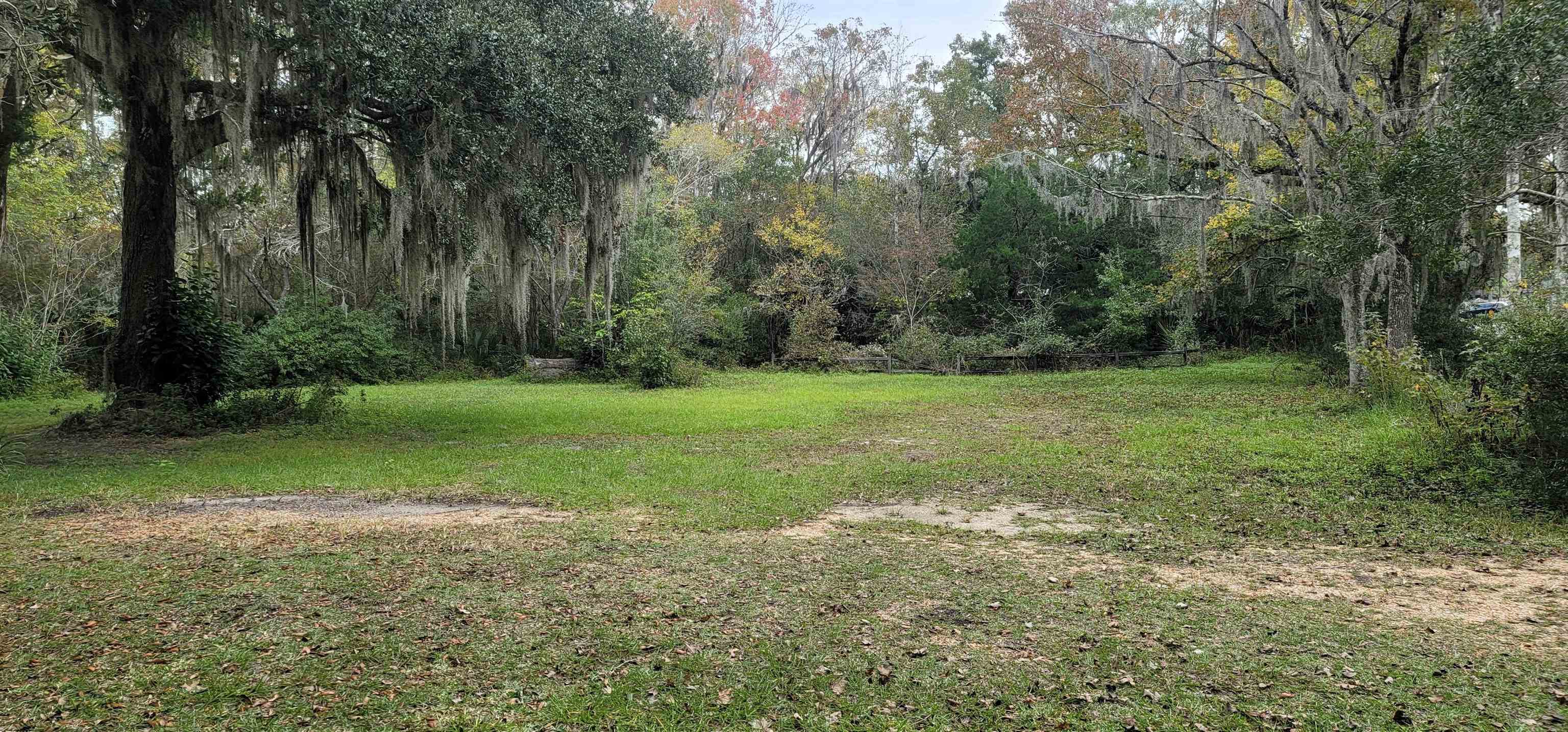 4920 Porter Road St. Augustine, FL 32095 - Photo 2 of 15 a view of a field with trees in the background