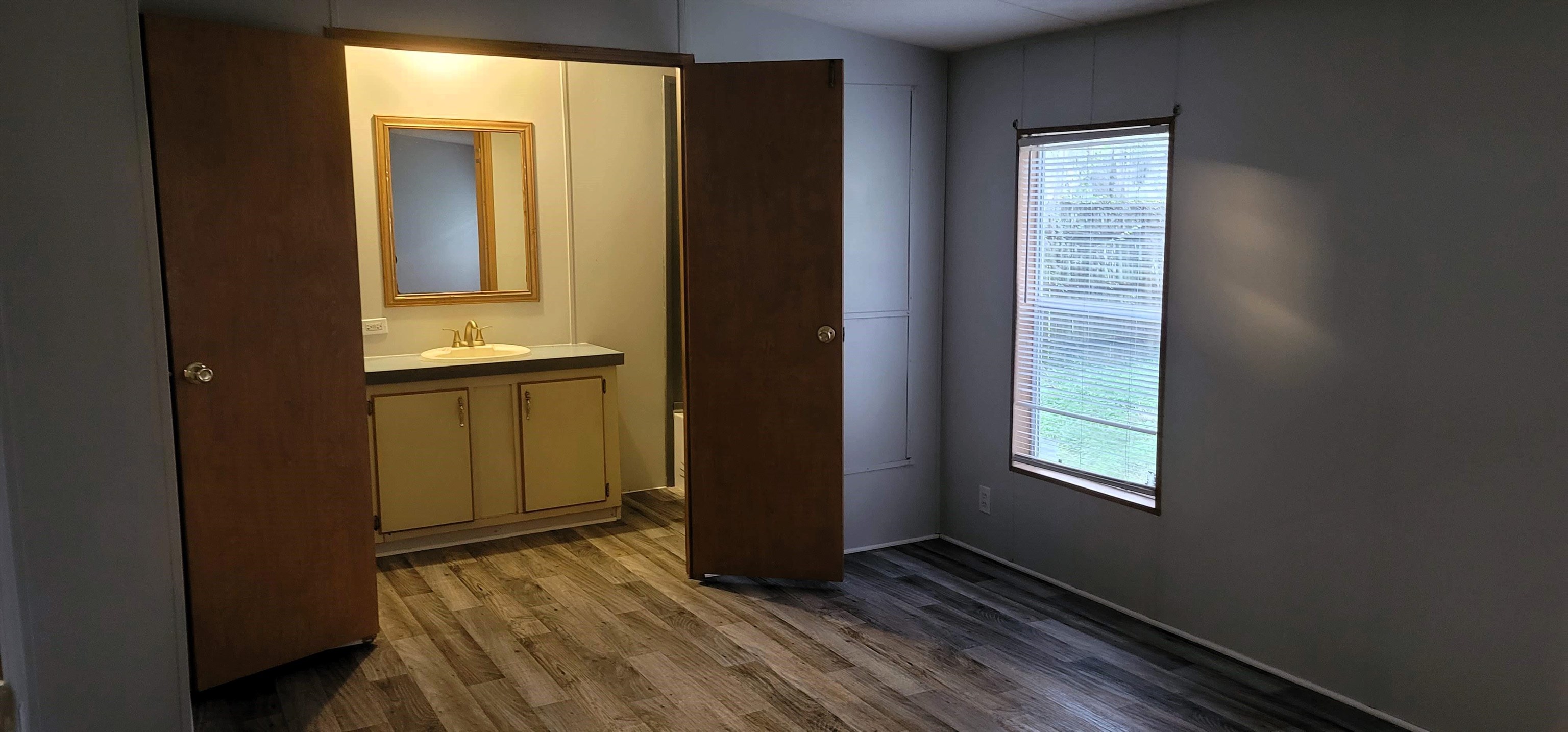 4920 Porter Road St. Augustine, FL 32095 - Photo 3 of 15 an empty room with windows