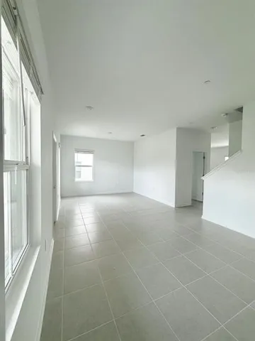 a view of a livingroom with a staircase