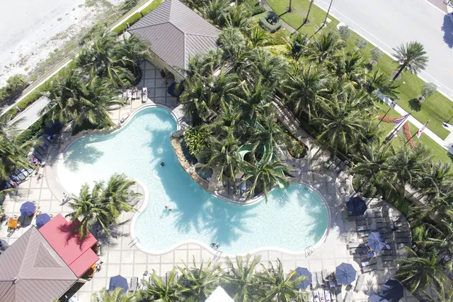 a room with lots of chairs and wooden floor