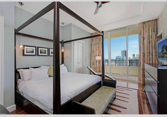 a bathroom with a tub and a shower