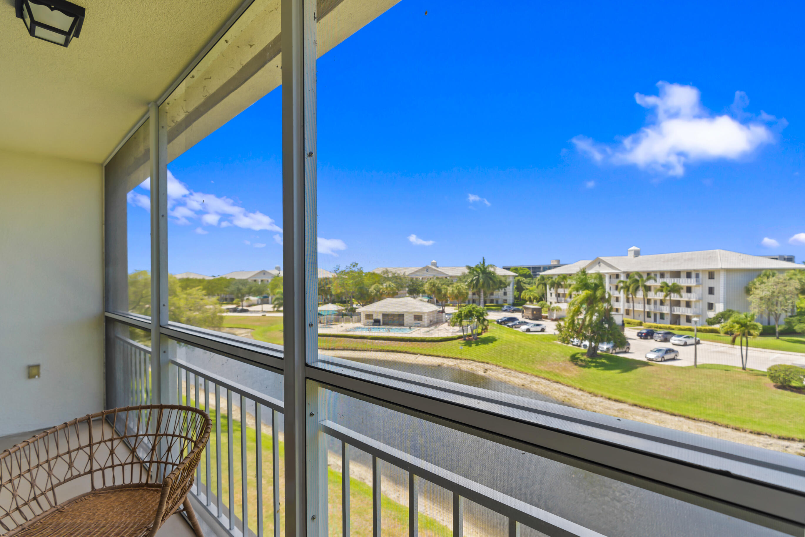 6217 Balboa Circle, Unit 404 Boca Raton, FL 33433 - Photo 5 of 42 Living Room Balcony View