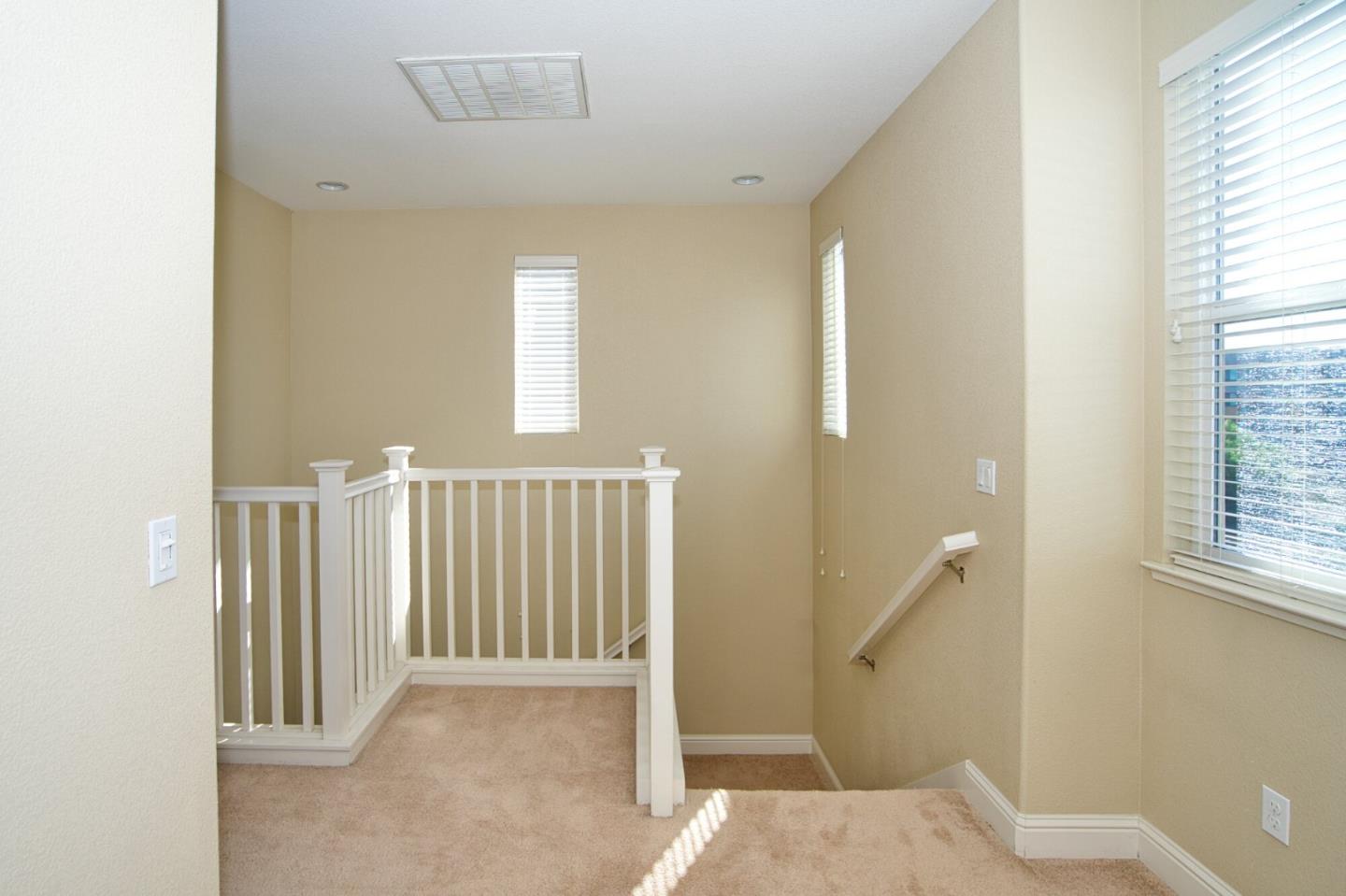1579 Canal Street Milpitas, CA 95035 - Photo 22 of 36 a view of a hallway with windows