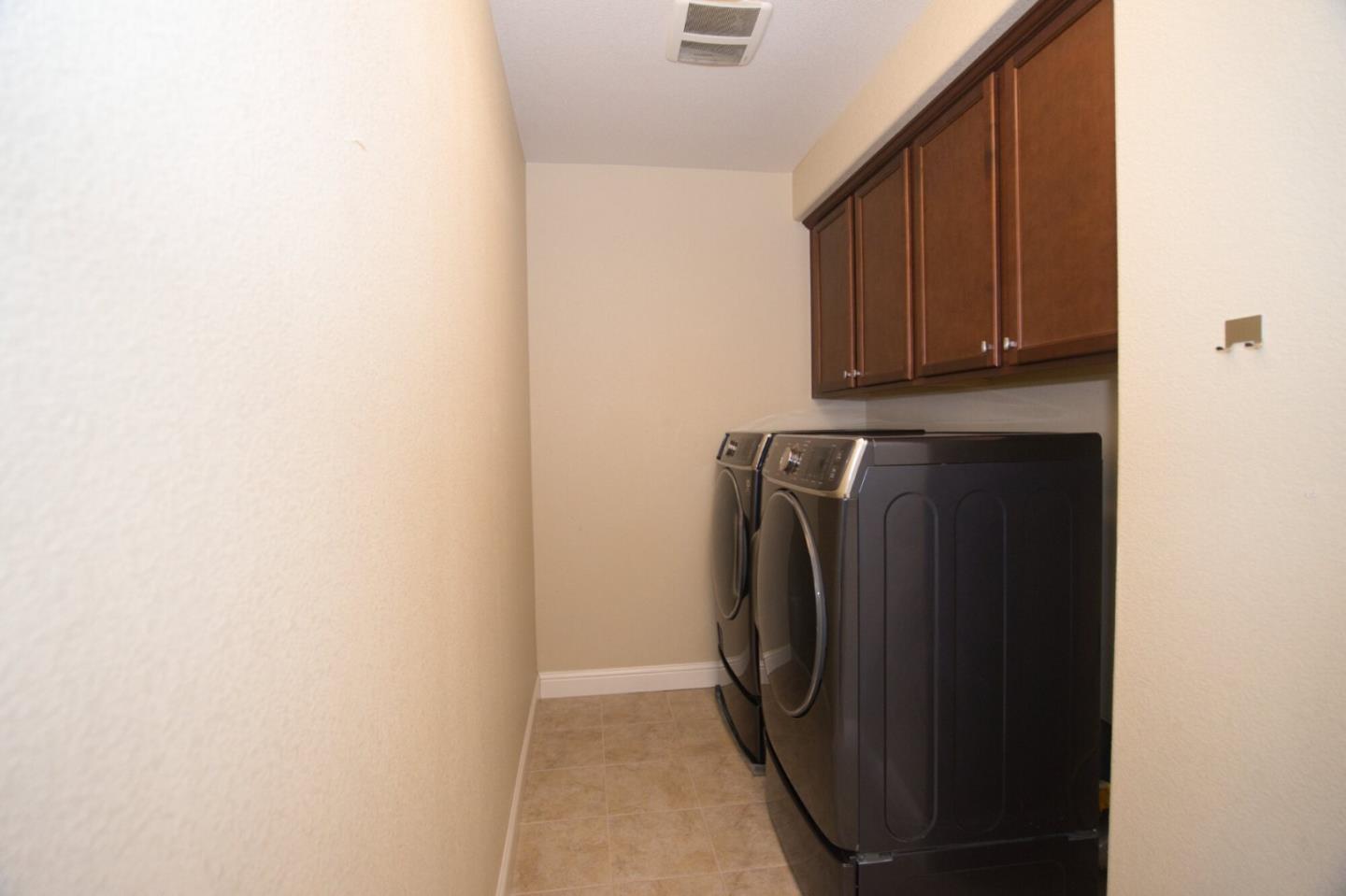 1579 Canal Street Milpitas, CA 95035 - Photo 24 of 36 a utility room with dryer and washer