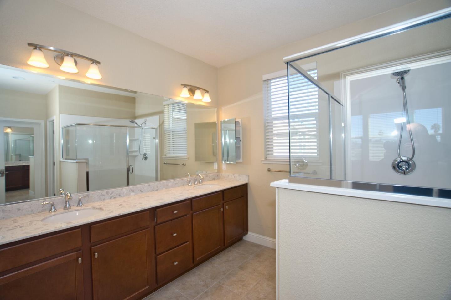 1579 Canal Street Milpitas, CA 95035 - Photo 27 of 36 a bathroom with a double vanity sink mirror and double