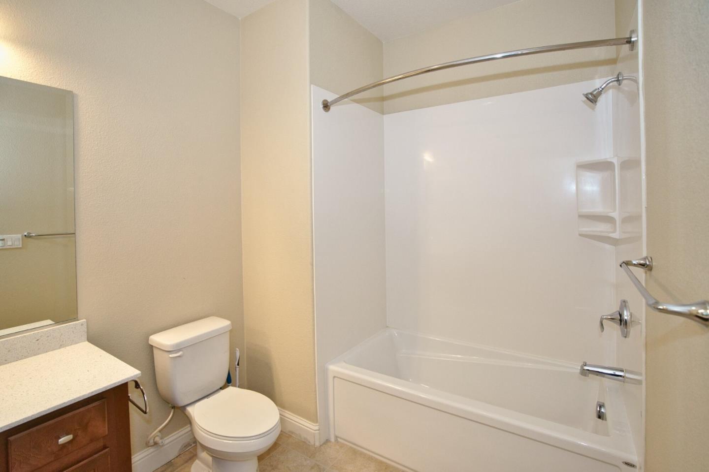1579 Canal Street Milpitas, CA 95035 - Photo 29 of 36 a white toilet sitting next to a bath tub