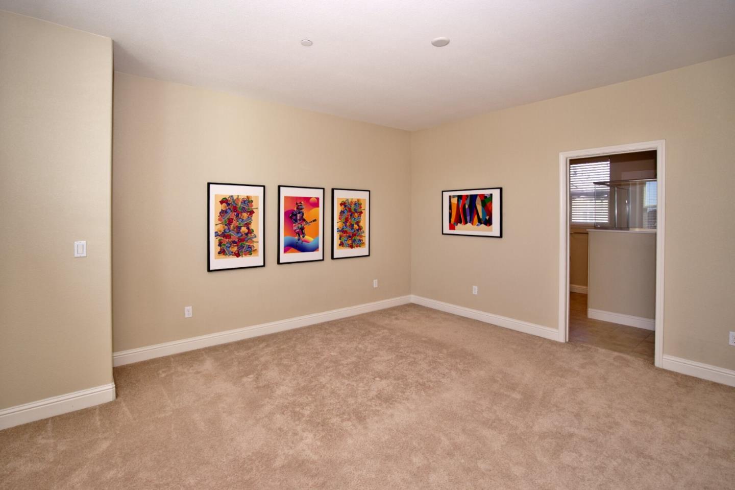 1579 Canal Street Milpitas, CA 95035 - Photo 32 of 36 an empty room with wall painting and a window