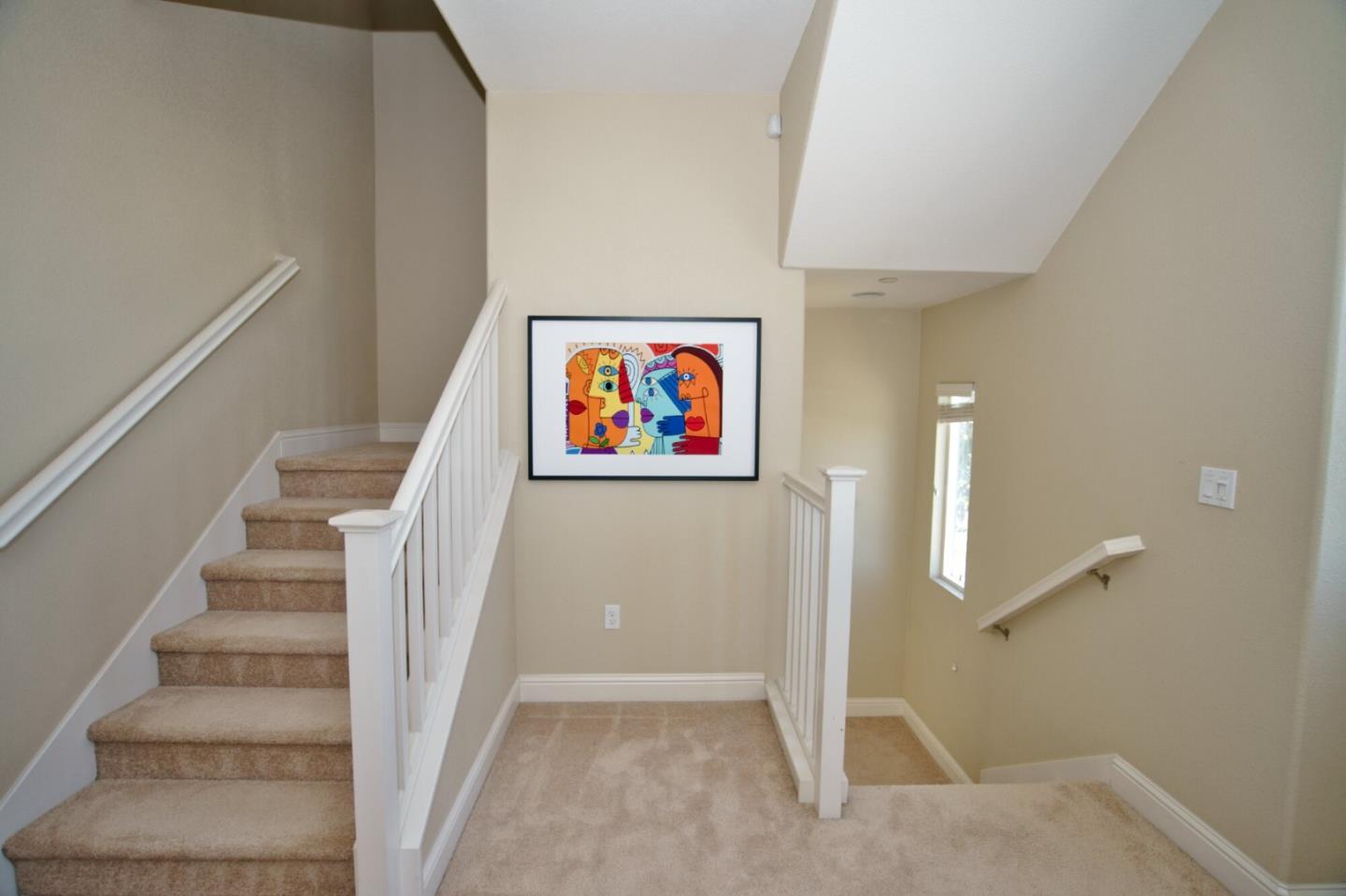 1579 Canal Street Milpitas, CA 95035 - Photo 7 of 36 a view of a hallway with staircase