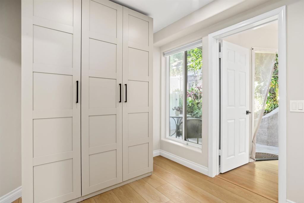 1622 Swallowtail Road Encinitas, CA 92024 - Photo 11 of 20 a view of a entrance and room with wooden floor