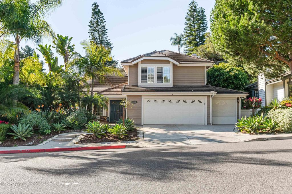 1622 Swallowtail Road Encinitas, CA 92024 - Photo 18 of 20 a view of a house with a garden and pathway