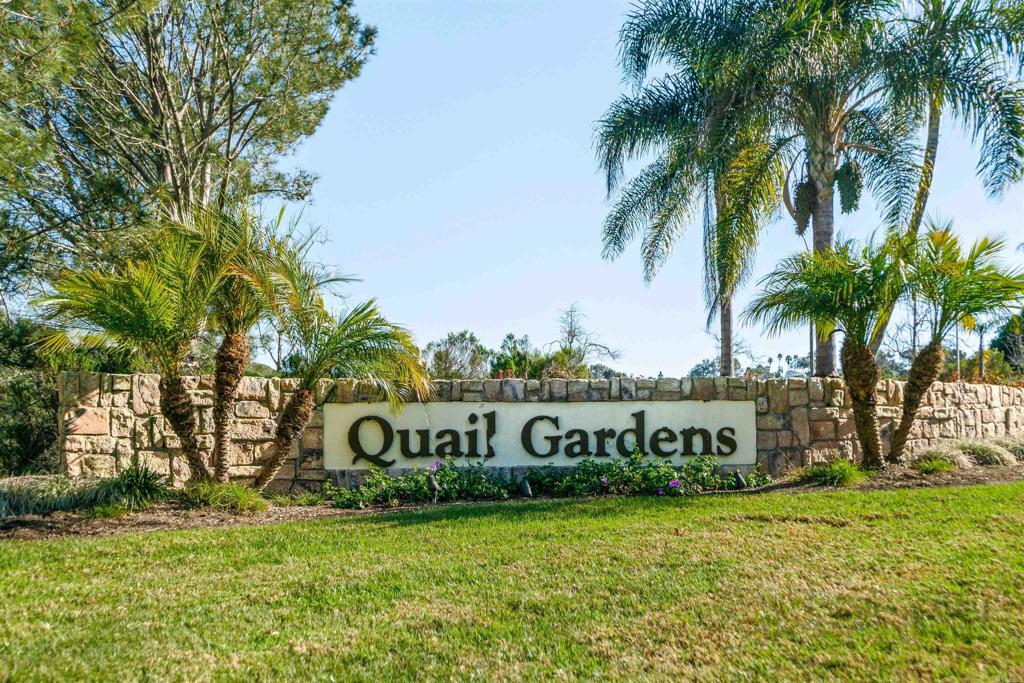 1622 Swallowtail Road Encinitas, CA 92024 - Photo 20 of 20 a sign of golf club on a wall under a tree