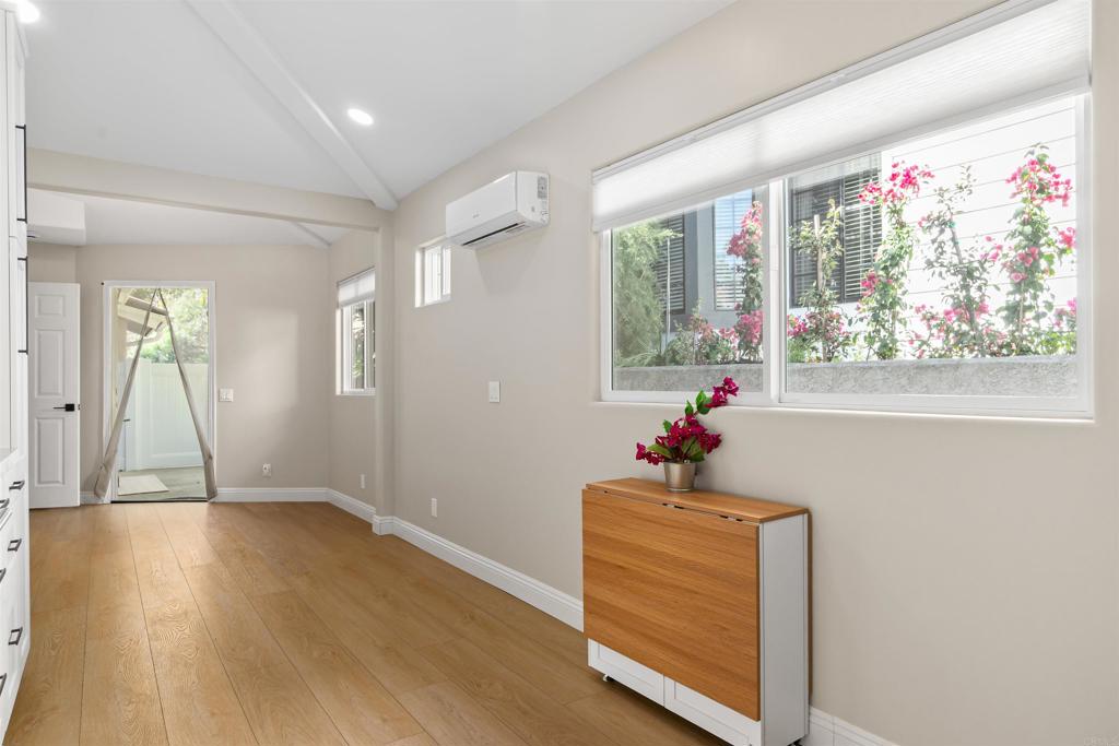 1622 Swallowtail Road Encinitas, CA 92024 - Photo 8 of 20 a living room with furniture and a window