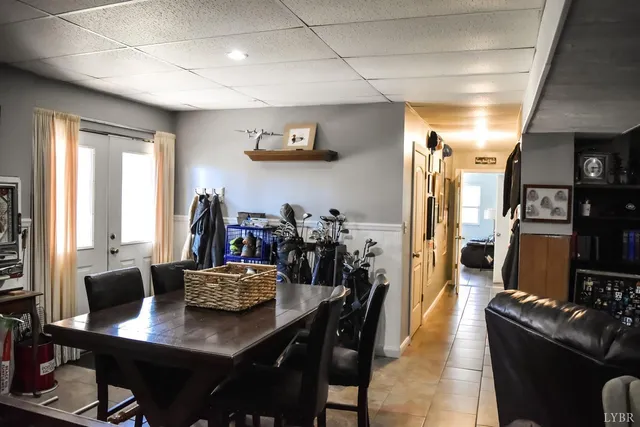a kitchen with granite countertop a refrigerator stove and microwave