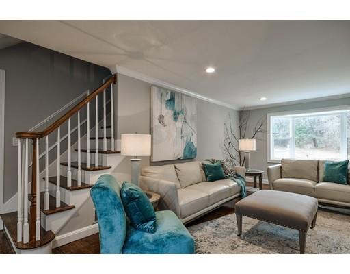 118 Concord Road Wayland, MA 01778 - Photo 11 of 28 a living room with furniture and a large window