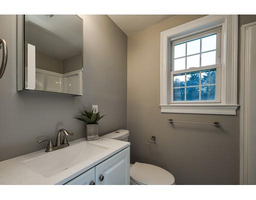 118 Concord Road Wayland, MA 01778 - Photo 19 of 28 a bathroom with a sink and a mirror