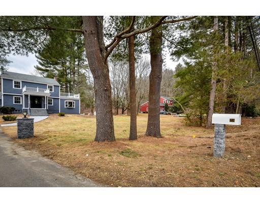 118 Concord Road Wayland, MA 01778 - Photo 23 of 28 a backyard of a house with table and chairs