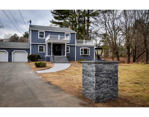 118 Concord Road Wayland, MA 01778 - Photo 24 of 28 a front view of a house with garden