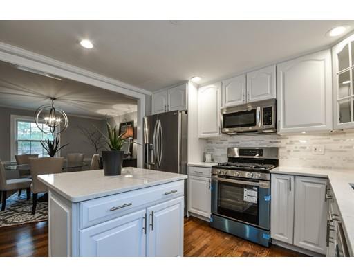 118 Concord Road Wayland, MA 01778 - Photo 6 of 28 a kitchen with a sink stainless steel appliances and cabinets