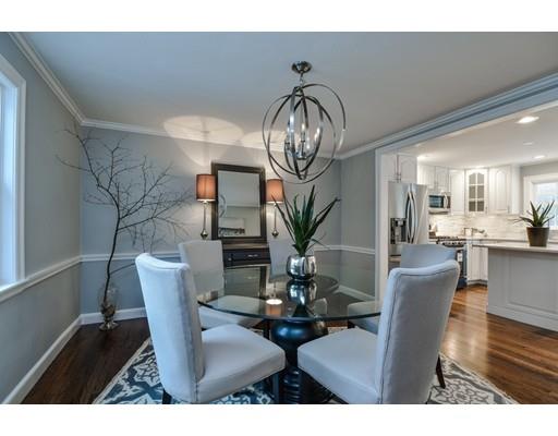 118 Concord Road Wayland, MA 01778 - Photo 7 of 28 a view of a dining room with furniture a chandelier and wooden floor