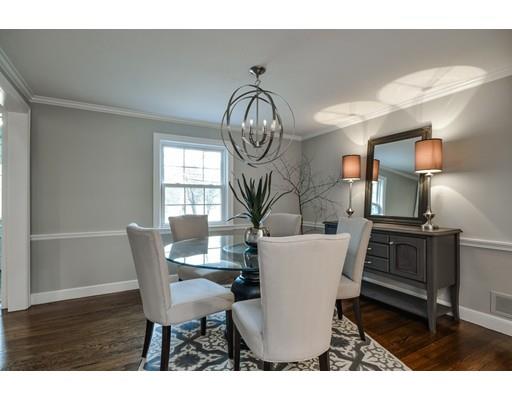 118 Concord Road Wayland, MA 01778 - Photo 8 of 28 a view of a dining room with furniture and a chandelier