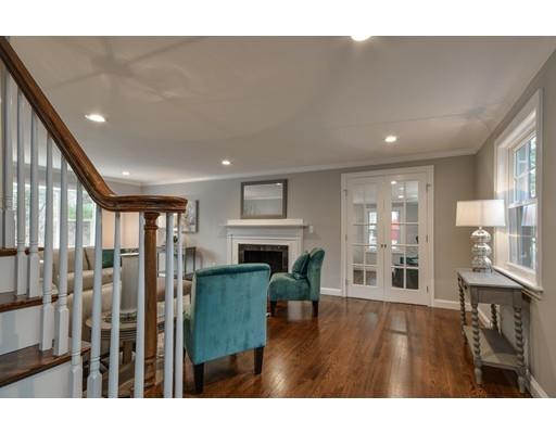 118 Concord Road Wayland, MA 01778 - Photo 9 of 28 a living room with furniture and a fireplace