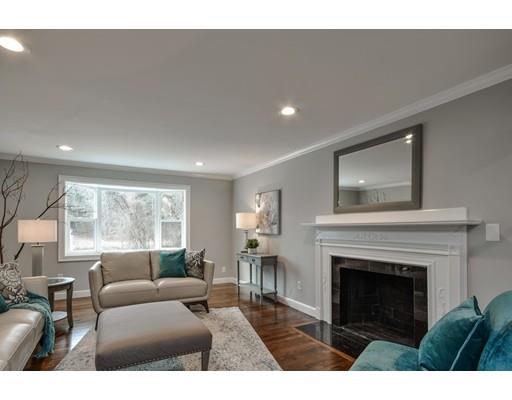 118 Concord Road Wayland, MA 01778 - Photo 10 of 28 a living room with furniture a window and a fireplace